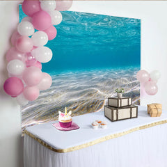 Lofaris Blauer Unterwasser Fotohintergrund mit Sandboden und Lichtreflexen, realistische Kulisse für professionelle Unterwasserfotografie
