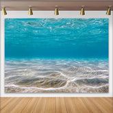 Lofaris Blauer Unterwasser Fotohintergrund mit Sandboden und Lichtreflexen, realistische Kulisse für professionelle Unterwasserfotografie