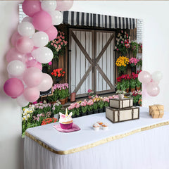 Lofaris Bunter Blumenladen Fotohintergrund mit rustikaler Holztür und Markise, eine idyllische Frühlingskulisse für Fotoshooting